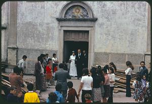 Wedding party exiting Church of San Leonardo di Limoges, Roccasicura, Italy