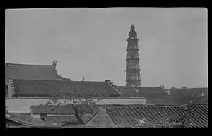 Rooftops with tower in background