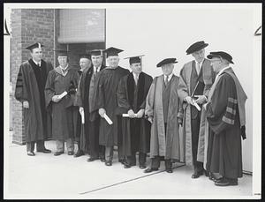 At Commencement Brandeis Honorary Degrees this year went to, left to right, Dr. Abraham Feinberg, Irving Dilliard, Robert Szold, Erwin N. Griswold, Judge Calvert Magruder, Judge Charles E. Wyzanski Jr., Supreme Court Justice Felix Frankfurter, and Dean Acheson, shown with Dr. Abram L. Sachar, Brandeis president.