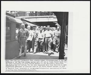 Walkout That Started Subway Strike - Motormen of the BMT division of the New York subway walk off job Coney Island depot today after suspension of three fellow members of the Motormen's Benevolent Association was not lifted. The men were suspended when they declined to take supervisory personnel on practice runs on the rapid transit system. At left is Theodore Loos, president of the Motormen's Benevolent Association.