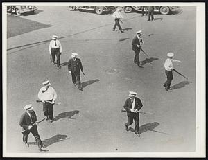 Gripping shotguns that a minute before wounded 68 persons in the truck drivers strike at Minneapolis, police disperse crowds that linger.