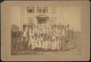 Class picture taken at the Centre Street School, showing children in front of school