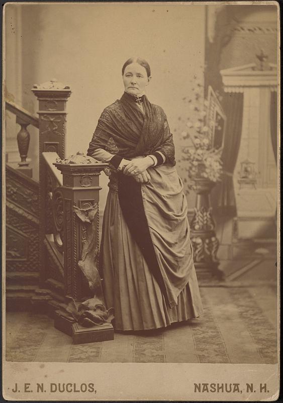 Unidentified woman standing