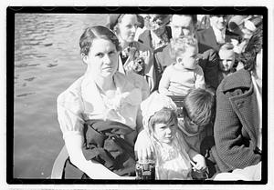 People on a swan boat including Maude Sanromá