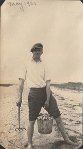 Albert T. Chase clamming on beach, West Yarmouth, Mass.