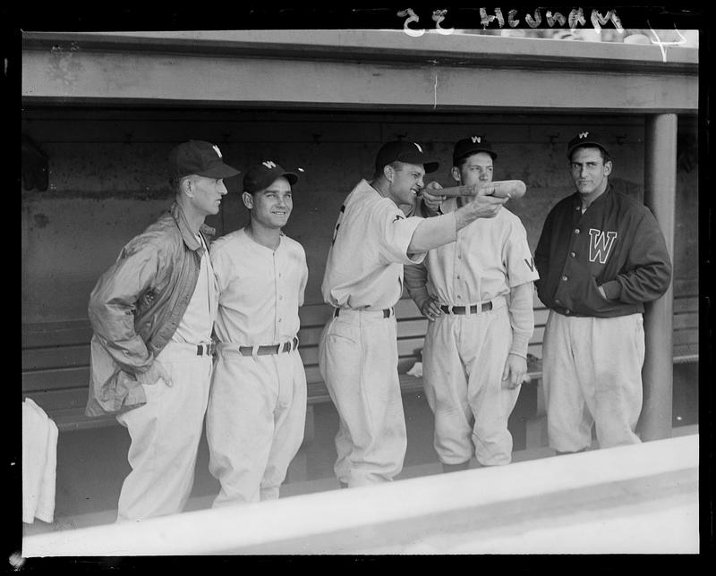 Washington Senator players in the dugout at Fenway Park