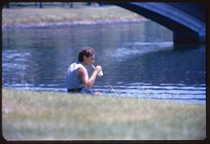 Woman sitting, Riverbend Park, Cambridge, Massachusetts