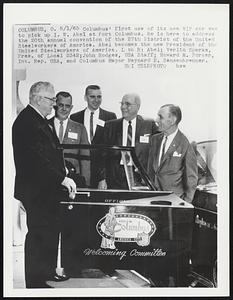 Columbus' first use of its new VIP car was to pick up I. W. Abel at Port Columbus. He is here to address the 20th annual convention of the 27th District of the United Steelworkers of America. Abel becomes the new President of the United Steelworkers of America. L to R: Abel; Verlin Sparks, Pres. of Local 2342; John Hodges, USA Staff; Howard M. Porter, Int. Rep. USA, and Columbus Mayor Maynard E. Sensenbrenner.