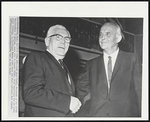 It's Final Now--I.W. Abel (left), President of the United Steelworkers of America, poses with R. Conrad Cooper, chief negotiator for the basic steel industry, in Pittsburgh Monday night where new steel contracts were signed.