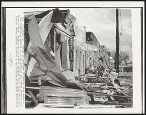 A forceful tornado ripped through this small town 2/21, emptying stores of their wares, raising roofs, and shearing walls. The tornados which cut accross Mississippi and Louisiana have claimed an estimated 60 lives.