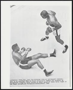 Overhead View of Patterson's Demise-- This is an overhead view of Floyd Patterson's tumble and knockout by Heavyweight Champion Sonny Liston in first round of their title fight in Las Vegas tonight.