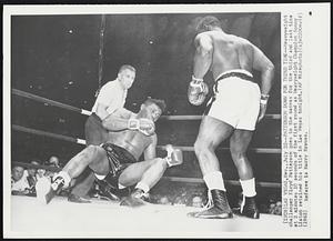 Patterson Down for Third Time-- Heavyweight challenger Floyd Patterson goes to the canvas for the third and last time at 2 minutes 10 seconds of the first round as Heavyweight Champion Sonny Liston retained his tittle in Las Vegas tonight.