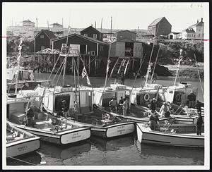Fleet of Tuna Boats prepare for a day's outing at Cape St. Mary, N.S.