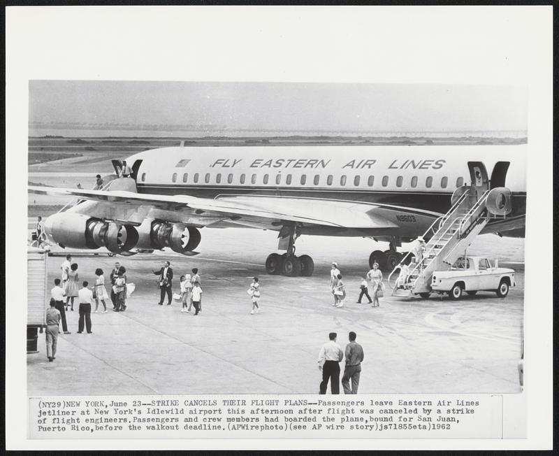 New York – Strike Cancels Their Flight Plans – Passengers leave Eastern Air Lines jetliner at New York’s Idlewild airport this afternoon after flight was canceled by a strike of flight engineers. Passengers and crew members had boarded the plane, bound for San Juan, Puerto Rico, before the walkout deadline.