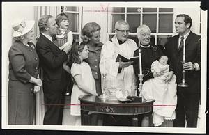 Mayor White's New Daughter, Patricia, christened last night. From left, Mrs. Patricia White, the mayor's mother; the mayor and son, Christopher, 21/2; daughter Caitlin, 10; Mrs. White; the Rev. Gerald L. Bucke of St. Joseph's Church. West End Mrs. Barbara Cameron of Hyde Park, the godmother; Baby Patricia, and Richard Dray. the godfather.