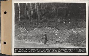 Contract No. 60, Access Roads to Shaft 12, Quabbin Aqueduct, Hardwick and Greenwich, stone fill bleeders in cut slope, looking ahead from Sta. 38+60, Greenwich and Hardwick, Mass., Aug. 22, 1938