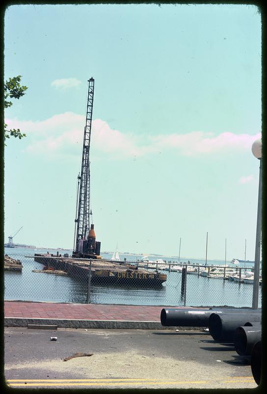 A crane on a floating wooden dock