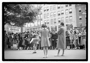 Two young women competing, Boston Common