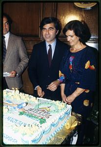 1982 Boston - Mike Dukakis and wife Kitty stand next to Mike's birthday cake