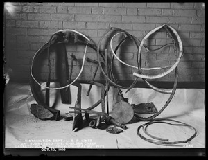 Distribution Department, Low Service Pipe Lines, 24-inch submerged pipe; gaskets, nuts, bolts, etc. removed with original 20-inch submerged pipe, Chelsea Creek; Chelsea, Mass., Oct. 10, 1900