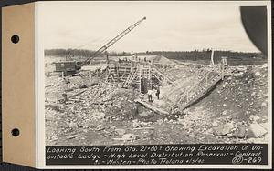 Contract No. 80, High Level Distribution Reservoir, Weston, looking south from Sta. 21+00+/- showing excavation of unsuitable ledge, high level distribution reservoir, Weston, Mass., Apr. 5, 1940