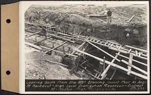 Contract No. 80, High Level Distribution Reservoir, Weston, looking south from Sta. 883 showing invert pour at angle of aqueduct, high level distribution reservoir, Weston, Mass., Apr. 5, 1940