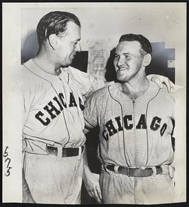 The Philadelphia Story that startled the baseball world yesterday was Pat Seerey's stroking four home runs for Chicago in the first game of the twin-bill with the Athletics. Chisox Manager Ted Lyons (left) congratulates his slugging outfielder.