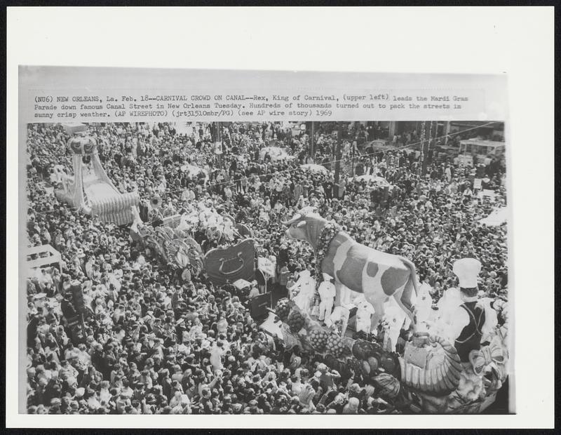 Carnival Crowd on Canal--Rex, King of Carnival, (upper left) leads the Mardi Gras Parade down famous Canal Street in New Orleans Tuesday. Hundreds of thousands turned out to pack the streets in sunny crisp weather.