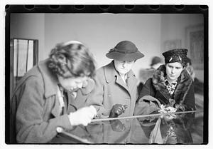 People including Maude Sanromá looking at exhibits, Museum of Fine Arts