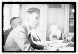 Group of men at table