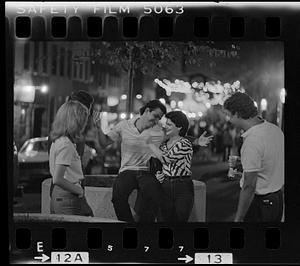 Young couples at Hanover Street summer festival, Boston