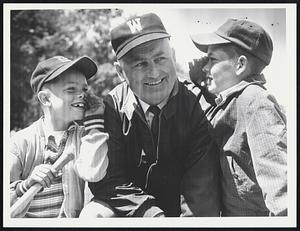 Coach Ray Yetten - Waltham. Gets an earful from his two sons. L t R. Ray "Ned" Yetten, Jr. 7 1/2. Peter, 12