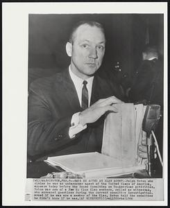 Says He Acted as Klan Agent--Ralph Roton who claims he was an undercover agent of the United Klans of America, appears today before the House of Committee on Un-American Activities. Roton was one of a few Ku Klux Klan members, called as witnesses, who answered questions during the current committee investigation. Asked if he was now a member of the Klan, Roton told the committee he didn't know if he was.