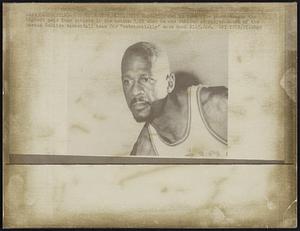 Boston, Mass.: Bill Russell (shown in 1966 file photo) became the highest paid team athlete in the nation 3/29 when he was rehired as player-coach of the Boston Celtics basketball team for "substantially" more than $125,000.