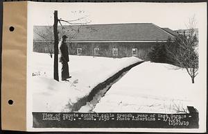 Contract No. 150, Installation of a Waterwheel, Generator, Switchgear, Transformer, Substation, and the Construction of a Transmission Line, Winsor Dam Power Plant, Belchertown, view of remote control cable trench, rear of East Garage, looking westerly, Winsor Dam, Quabbin Reservoir, Belchertown, Mass., Jan. 13, 1947