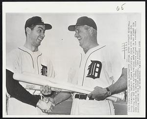 Lakeland, Fla. -- Colavito Jovial After Contract Signing -- Rocky Colavito, Detroit Tigers outfielder, jokes with manager Bob Scheffing at the club's spring training camp after he had signed his 1962 contract in Lakeland today. Colavito signed his contract this morning ending his brief holdout.