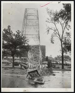 Giant Tower of Television Station WBZ-TV, Soldiers Field Rd., Brighton, was a victim of the hurricane. In its fall the tower virtually demolished a large automobile parked in front of station.