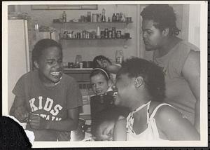 Group of young people in the art room with Liz