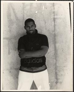 Man posing with arms crossed
