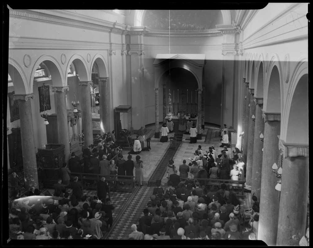 a-crowd-seated-in-church-attending-a-religious-ceremony-digital