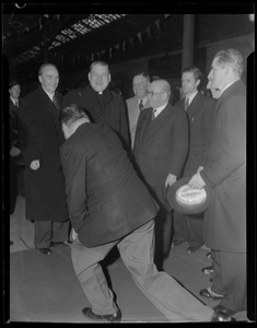 Group of men with Rev. Cushing