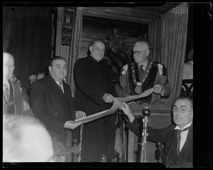 Dr. P. J. Hernon handing to Archbishop Richard Cushing and Gov. Paul Dever their Freedoms of the City