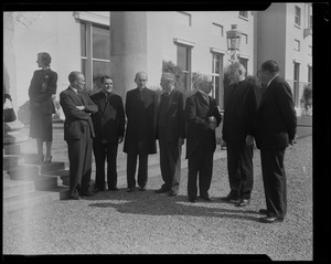 Group of men and clergy, including Rev. Cushing and Gov. Paul Dever