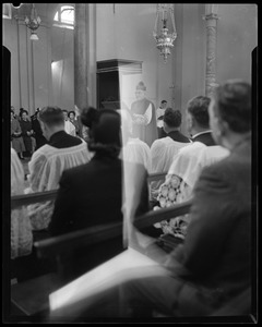 Rev. Cushing speaking before a congregation