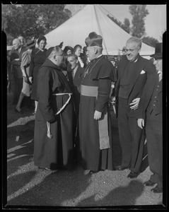 Rev. Cushing speaking with another member of the clergy