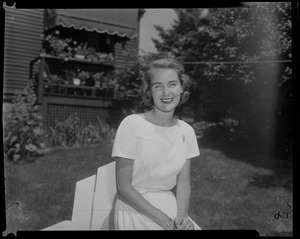 Kathryn White (formerly Galvin) sitting in chair, posing