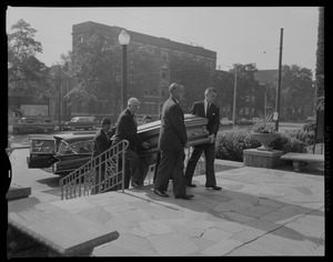 Pallbearers with coffin