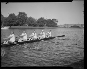 Five members of the crew team (including Gov. Leverett Saltonstall) in the boat, rowing