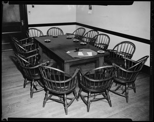 Table with 12 chairs around it
