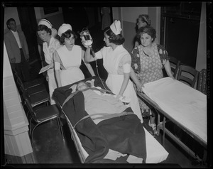 Nurses with an injured child